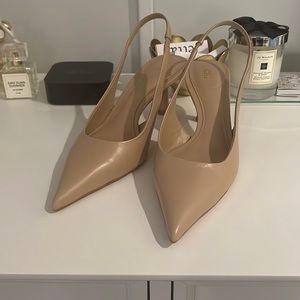 Slingback heel, never been worn! Beige color, 2 in heel. Size 8.